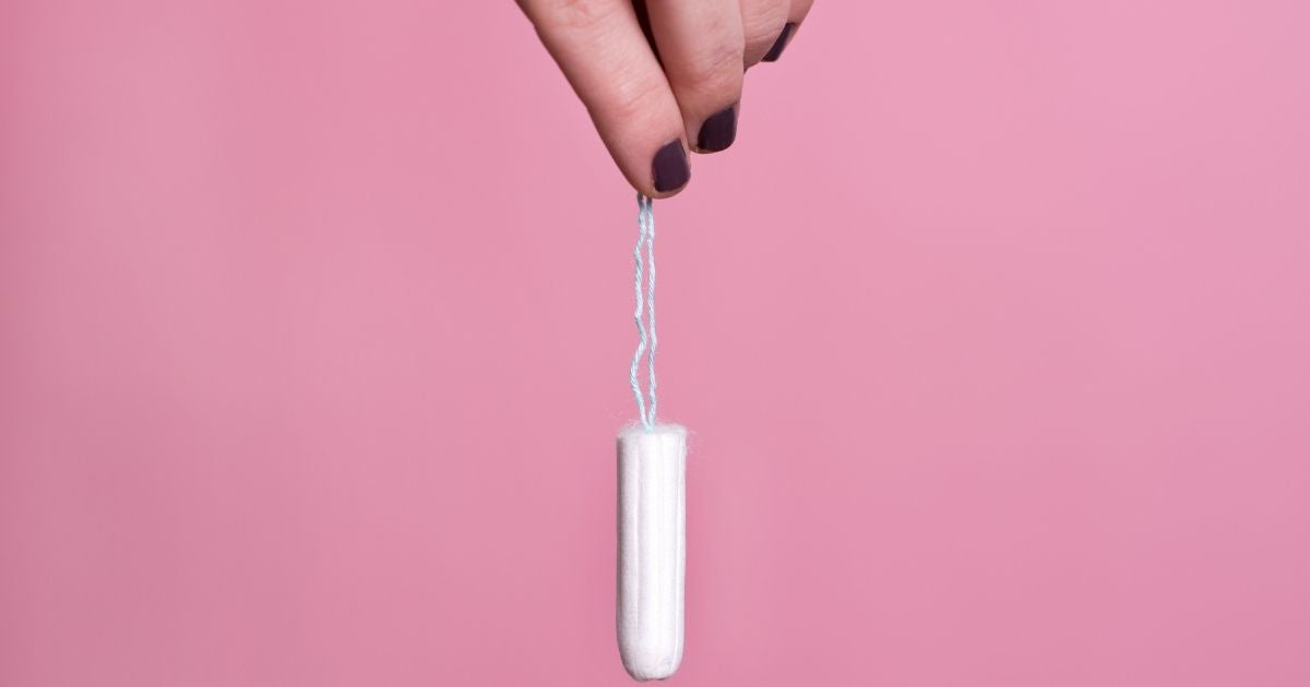 Hand holding a tampons