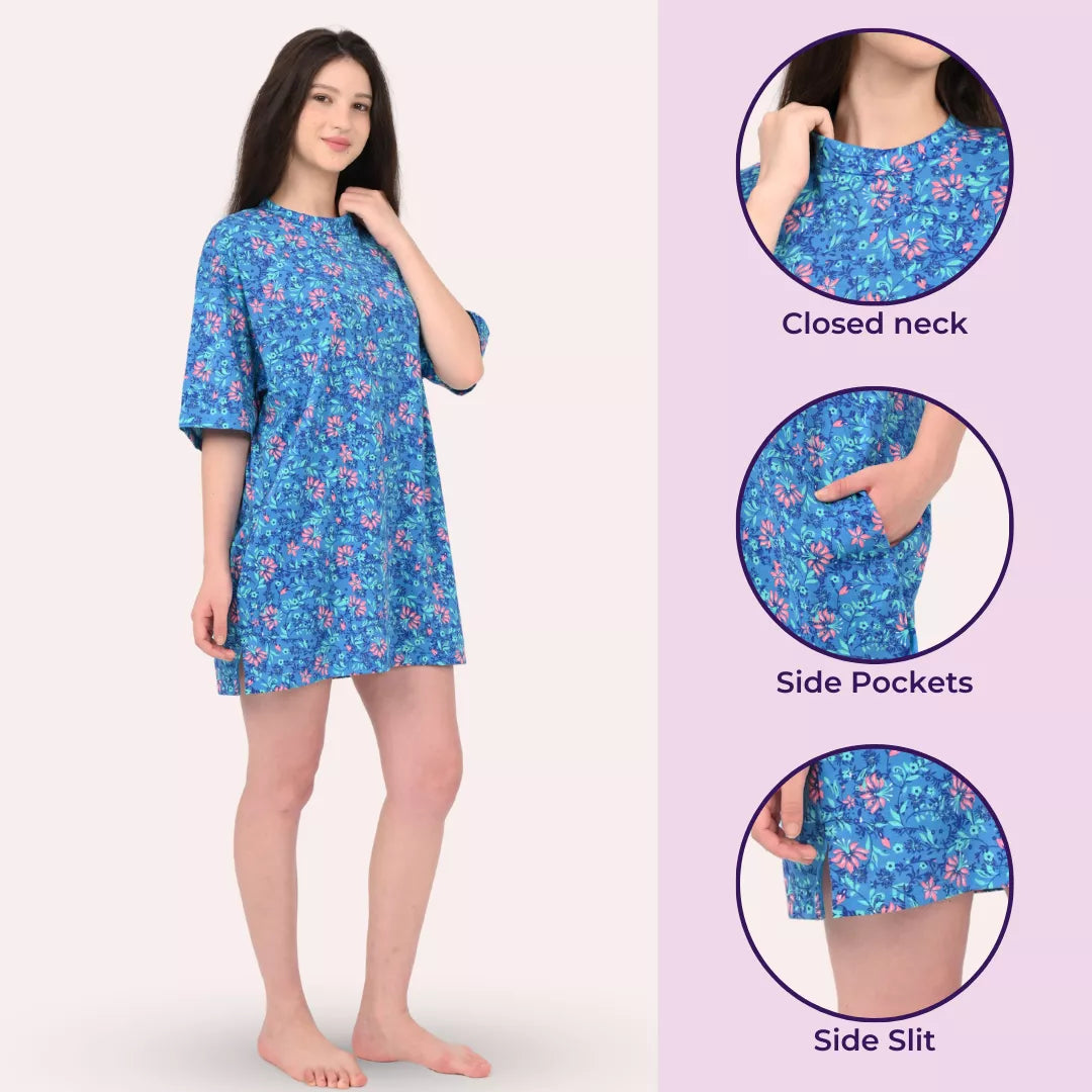 Woman wearing a blue floral baggy t- shirt with close-up detail