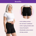 Woman wearing black shorts with product benefits listed on a light pink background