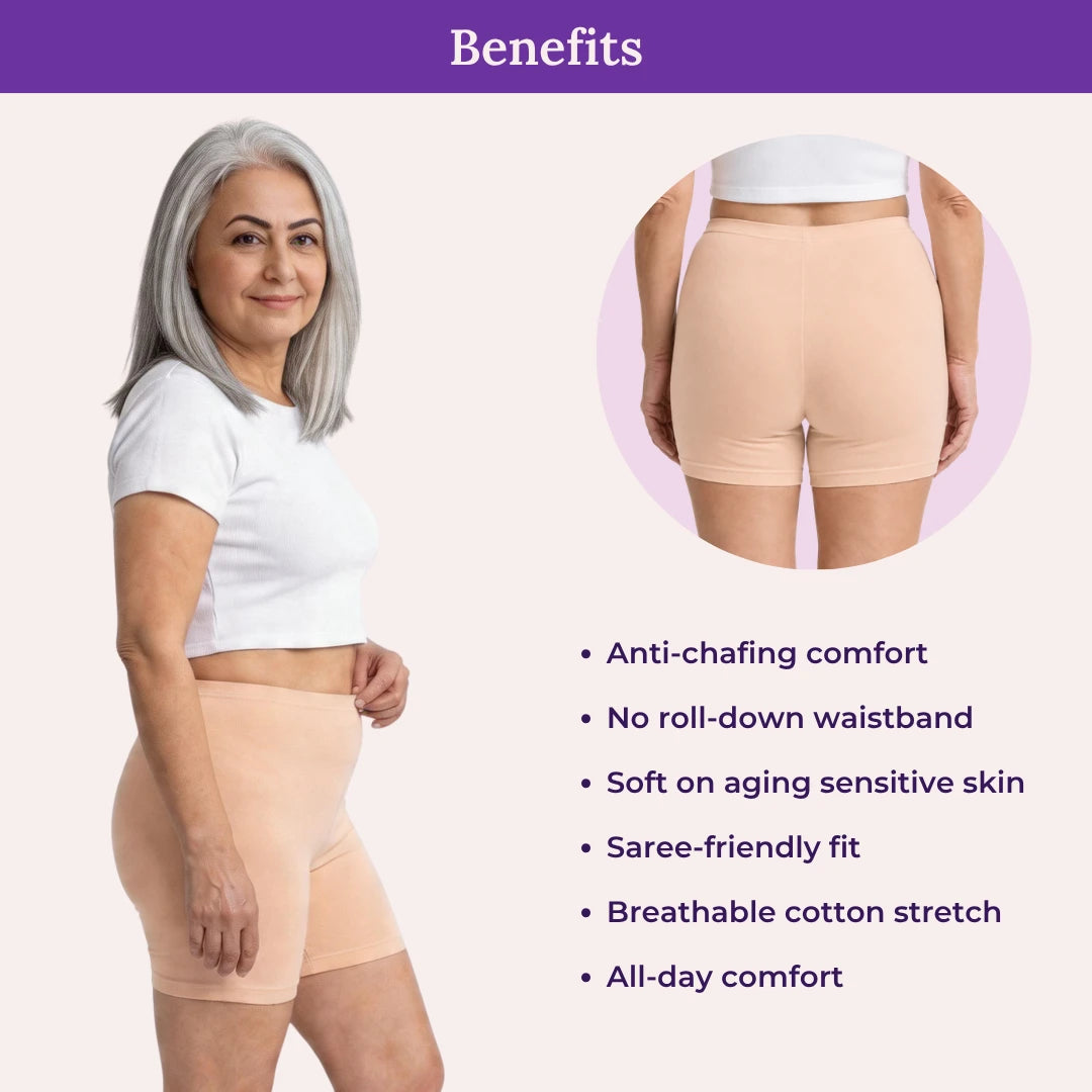 Woman wearing skin shorts with product benefits listed on a light pink background