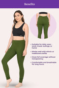 Woman wearing green color churidar leggings 