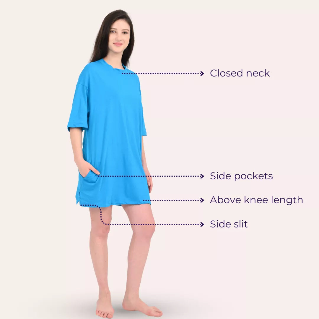 Woman wearing a bright blue oversize t-shirt with labeled features