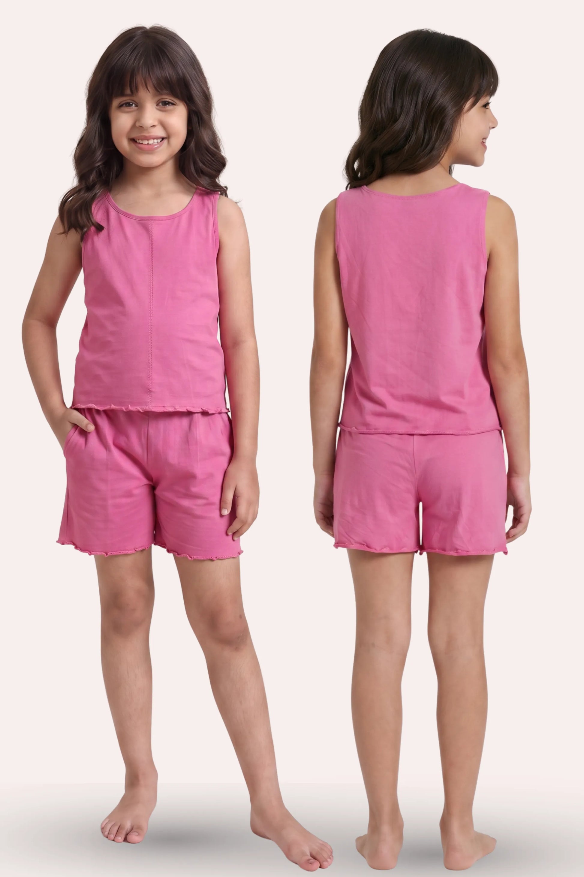 A young girl modeling a bright pink sleeveless top and matching shorts set, shown from both the front and back views against a plain light beige background.