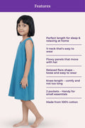 A girl wearing a sleeveless peacock blue dress showing listed features.