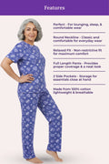 Woman wearing a navy hearts pajama set with text detailing features