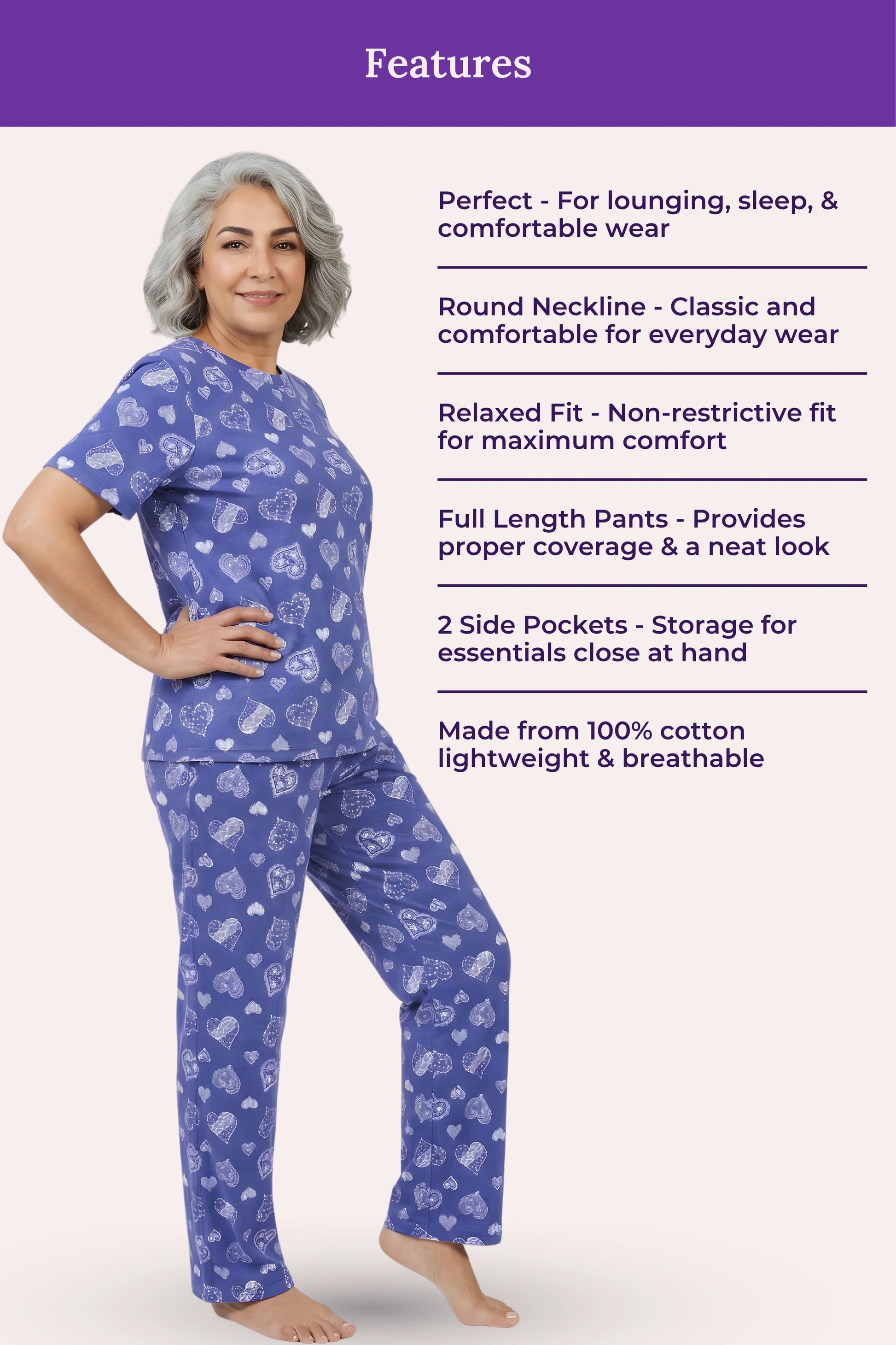 Woman wearing a navy hearts pajama set with text detailing features