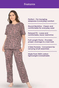 Woman wearing a brown leopard print pajama set with product features listed