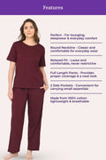 Woman wearing a wine pajama set with product features listed