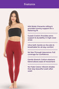 Woman wearing black bandeau top and maroon leggings with feature text on a white background