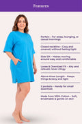 A woman model a bright blue t-shirt with a closed neckline, shown features.