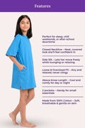 A girl model wearing a bright blue nightdress with features.