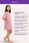Pink dress worn by a girl with features listed on a white background