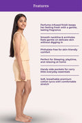A girl modeling a light peach sleeveless dress or tunic with side pockets, shown in profile on a pale background with a purple header reading 'Features' and descriptive text about the garment.
