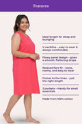 A woman modeling a sleeveless dark pink knee-length dress with a features.