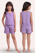 A young girl modeling a lavender sleeveless two-set, shown from both the front and back views against a solid light beige background.
