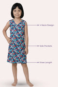 A girl model wearing a sleeveless knee-length dress with a blue floral print, shown callout features.