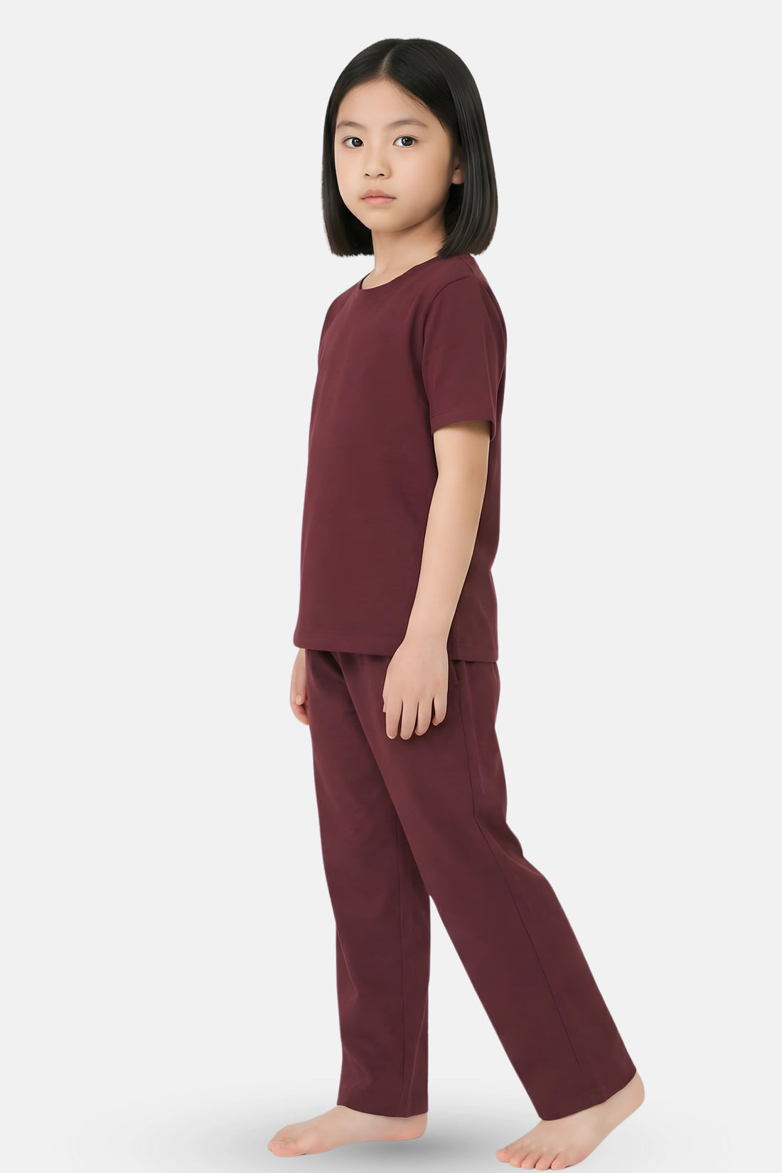 Girl wearing a wine pajama set