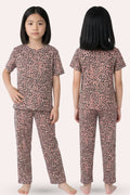 Girl wearing a brown leopard print pajama set from front and back views
