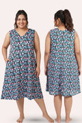 A plus-size woman model a sleeveless V-neck dress with a black floral print, shown both the front and back views.
