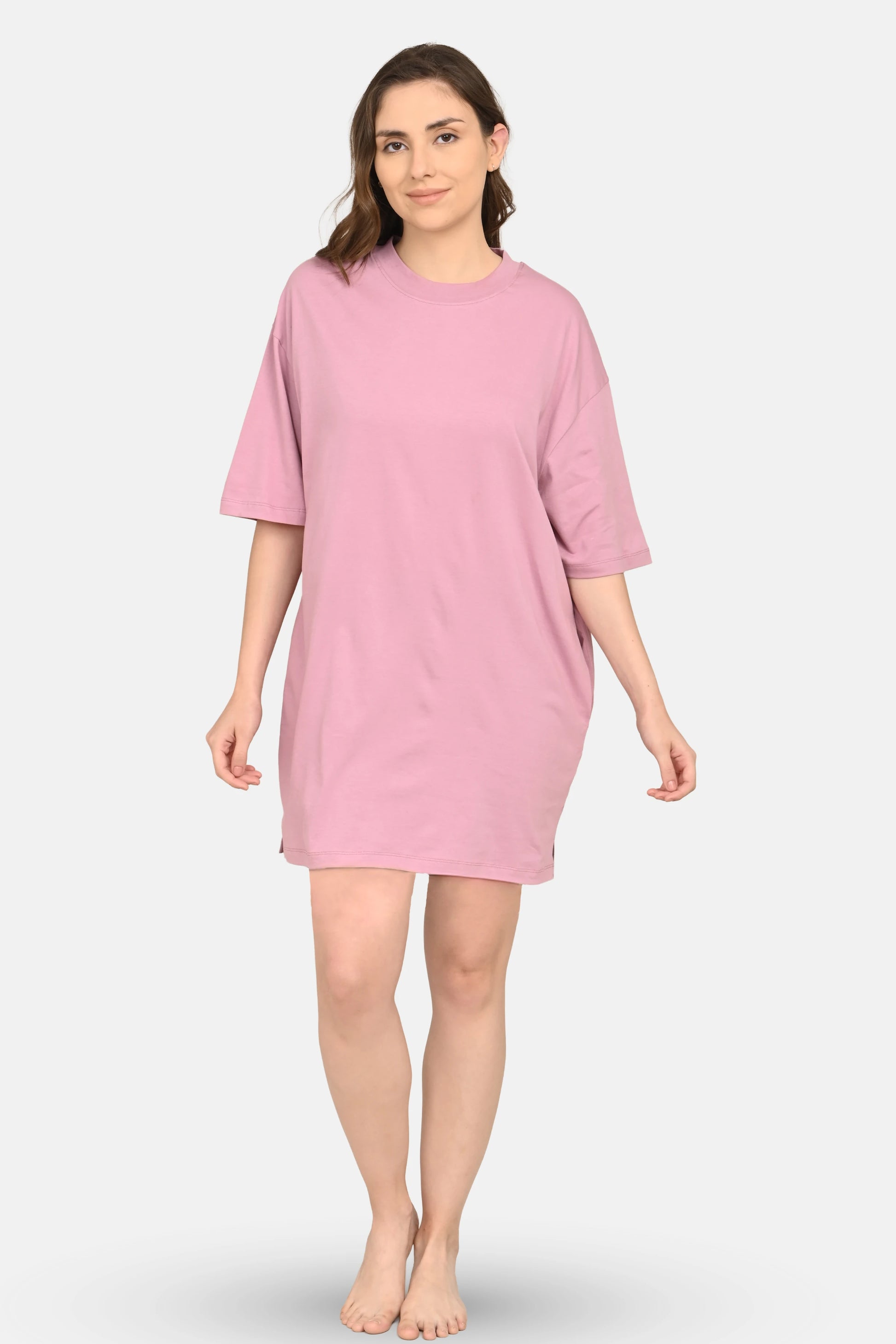 Woman wearing a purple dress on a white background