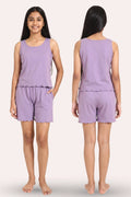 A girl model shown from the front and back wearing a matching lavender sleeveless top and shorts set against a plain light background.