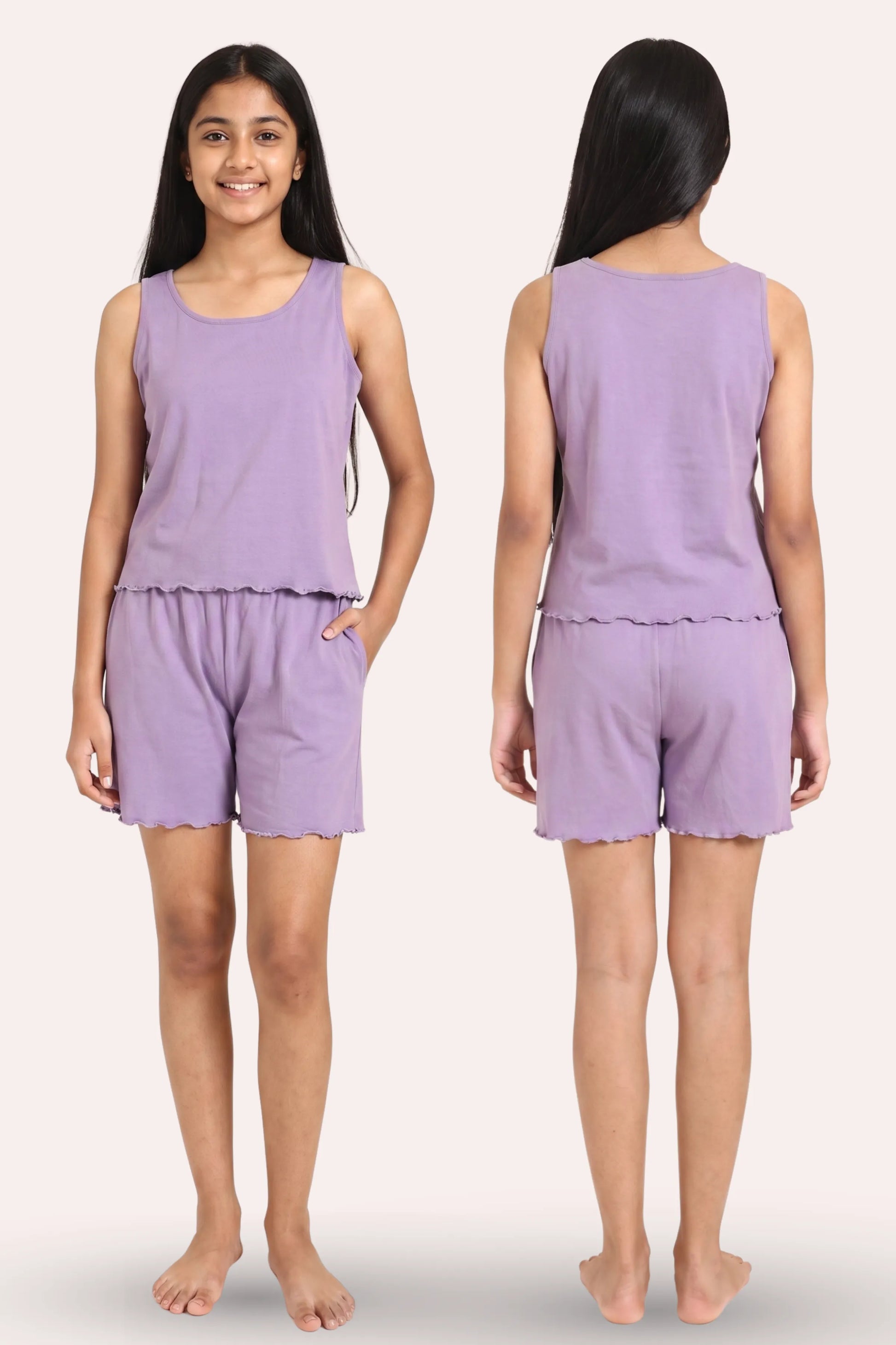A girl model shown from the front and back wearing a matching lavender sleeveless top and shorts set against a plain light background.