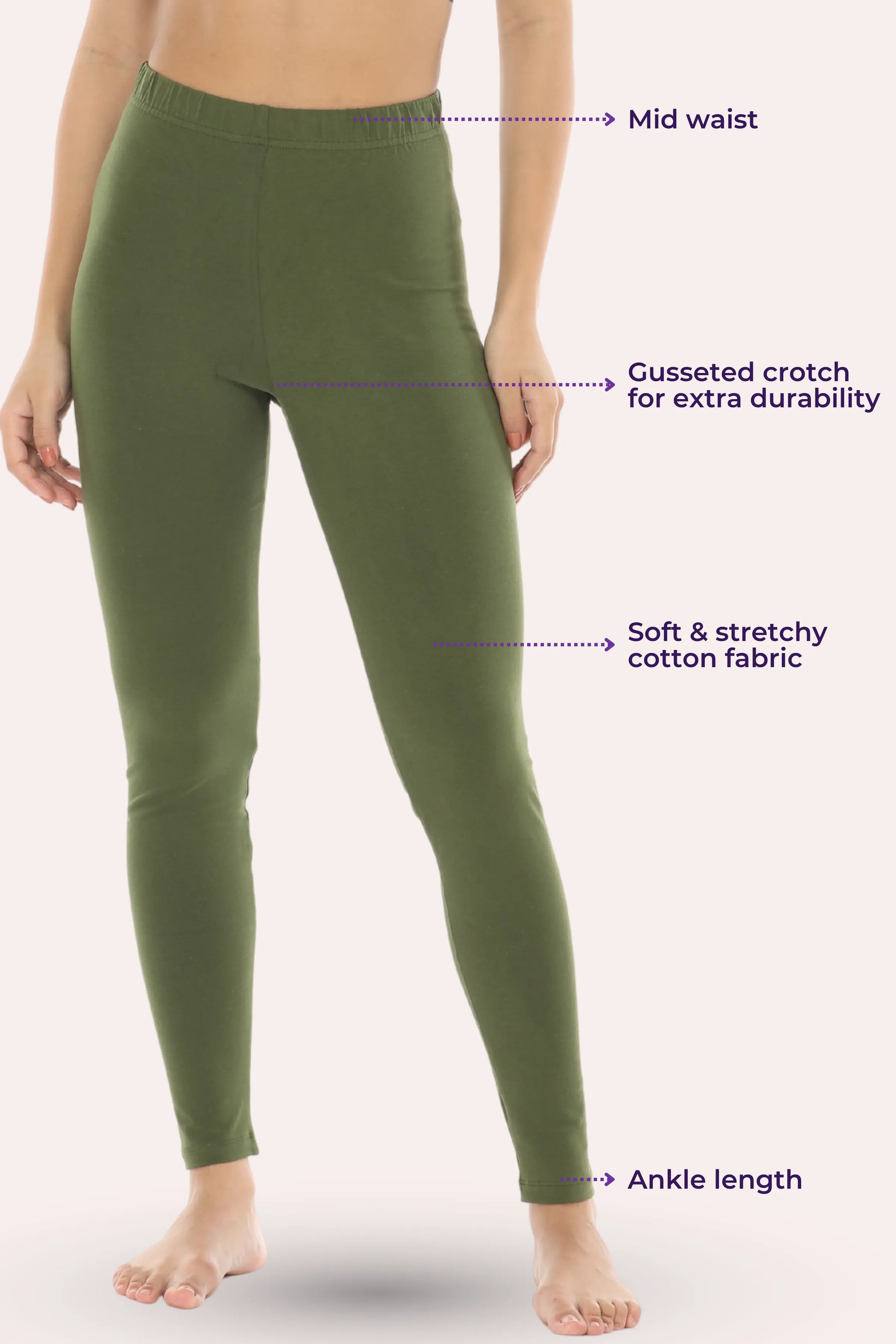 Green leggings with text labels on a white background