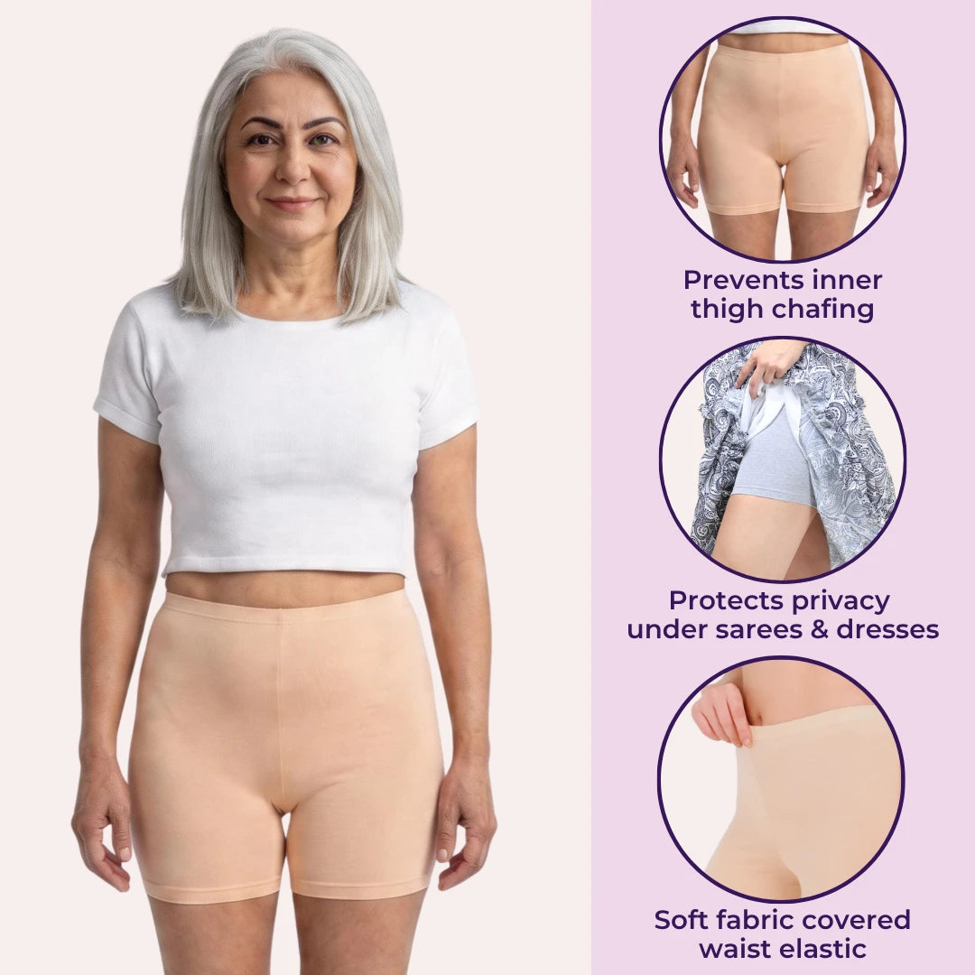 Woman wearing navy blue undershorts with inset images of the different colors same products