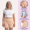 Woman wearing skin shorts with product features highlighted on a pink background