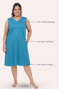 A woman modeling a sleeveless knee-length nightgown peacock blue with a callout features
