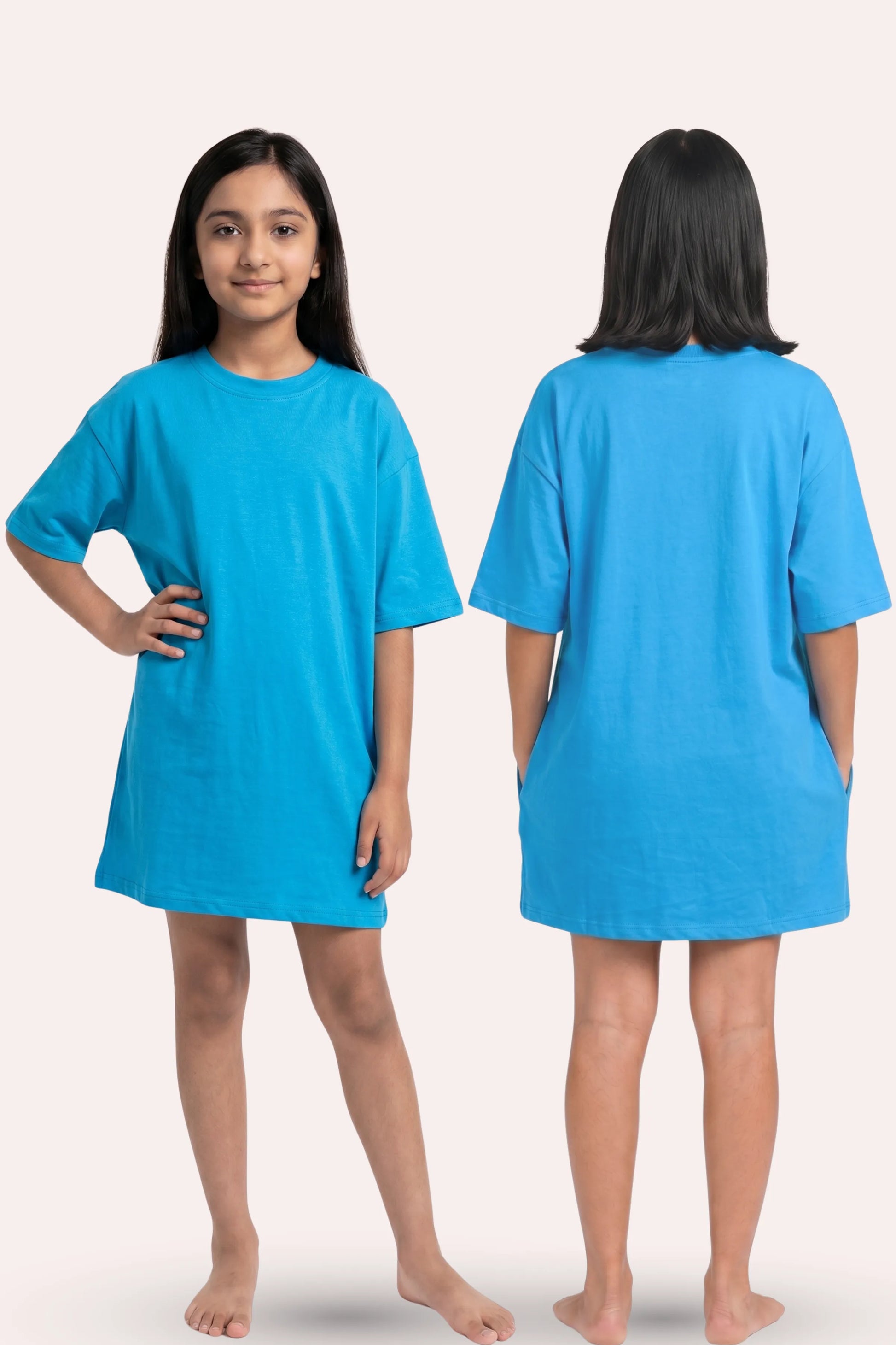 A girl model shown from the front and back wearing a bright blue t-shirt.