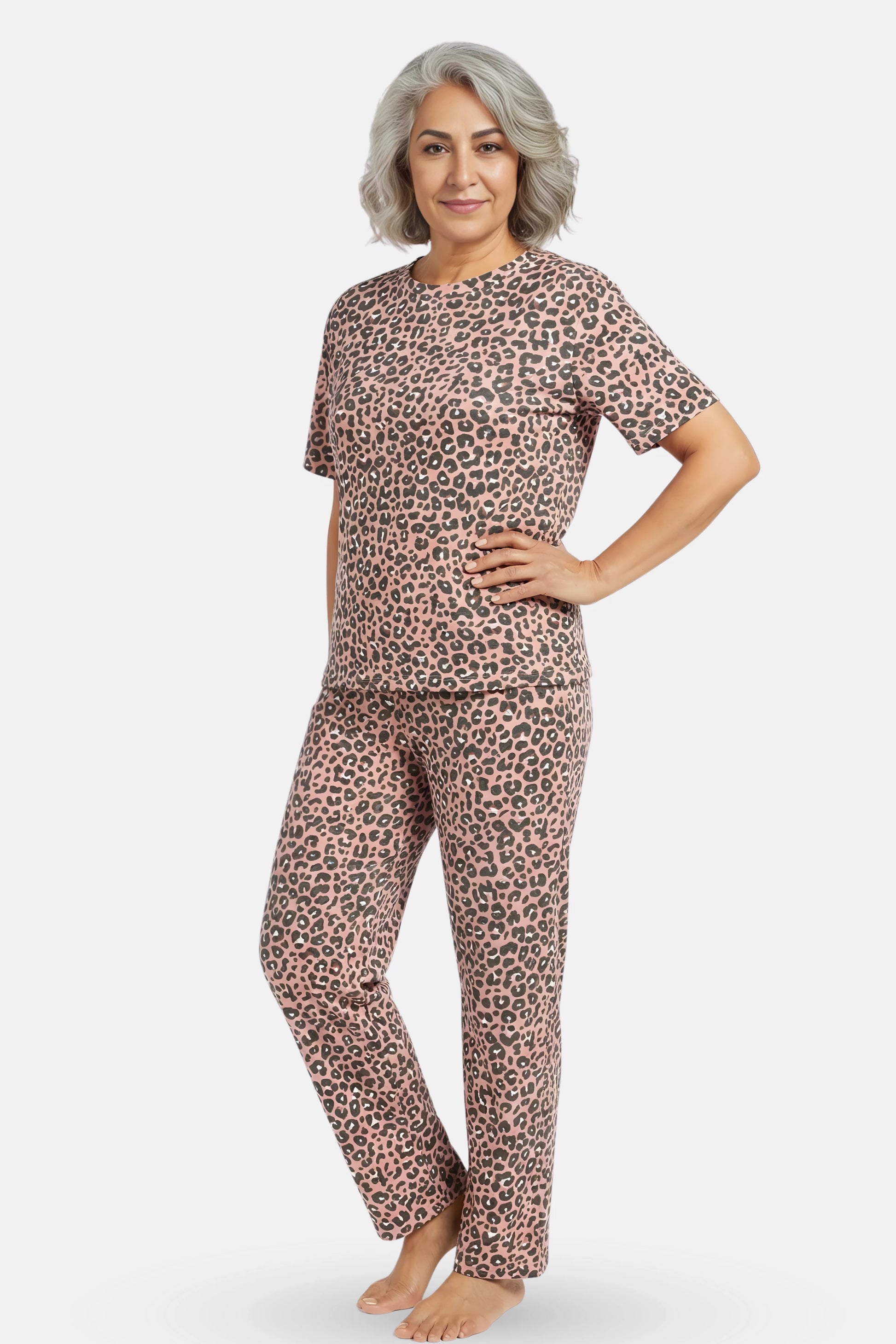 Woman wearing brown leopard print pajamas