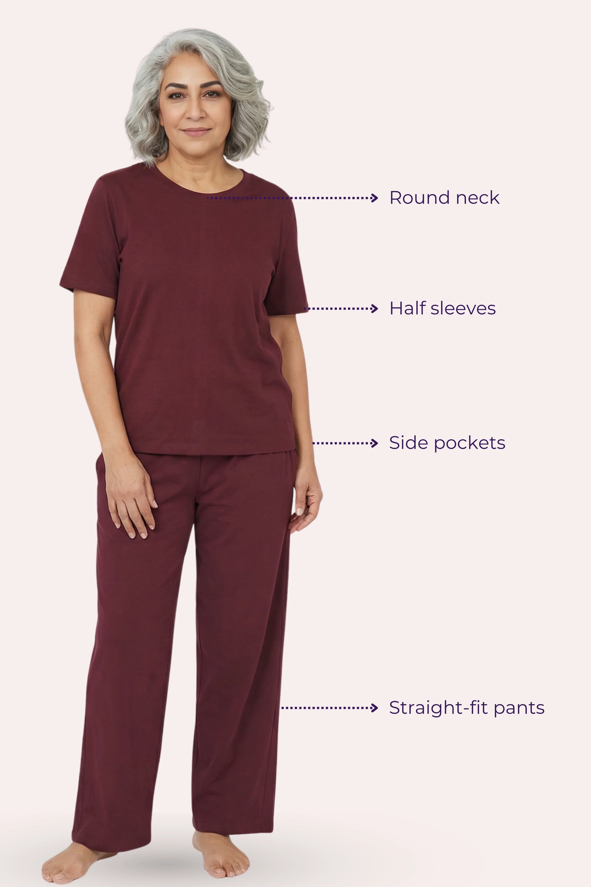 Woman wearing a wine outfit with labeled features