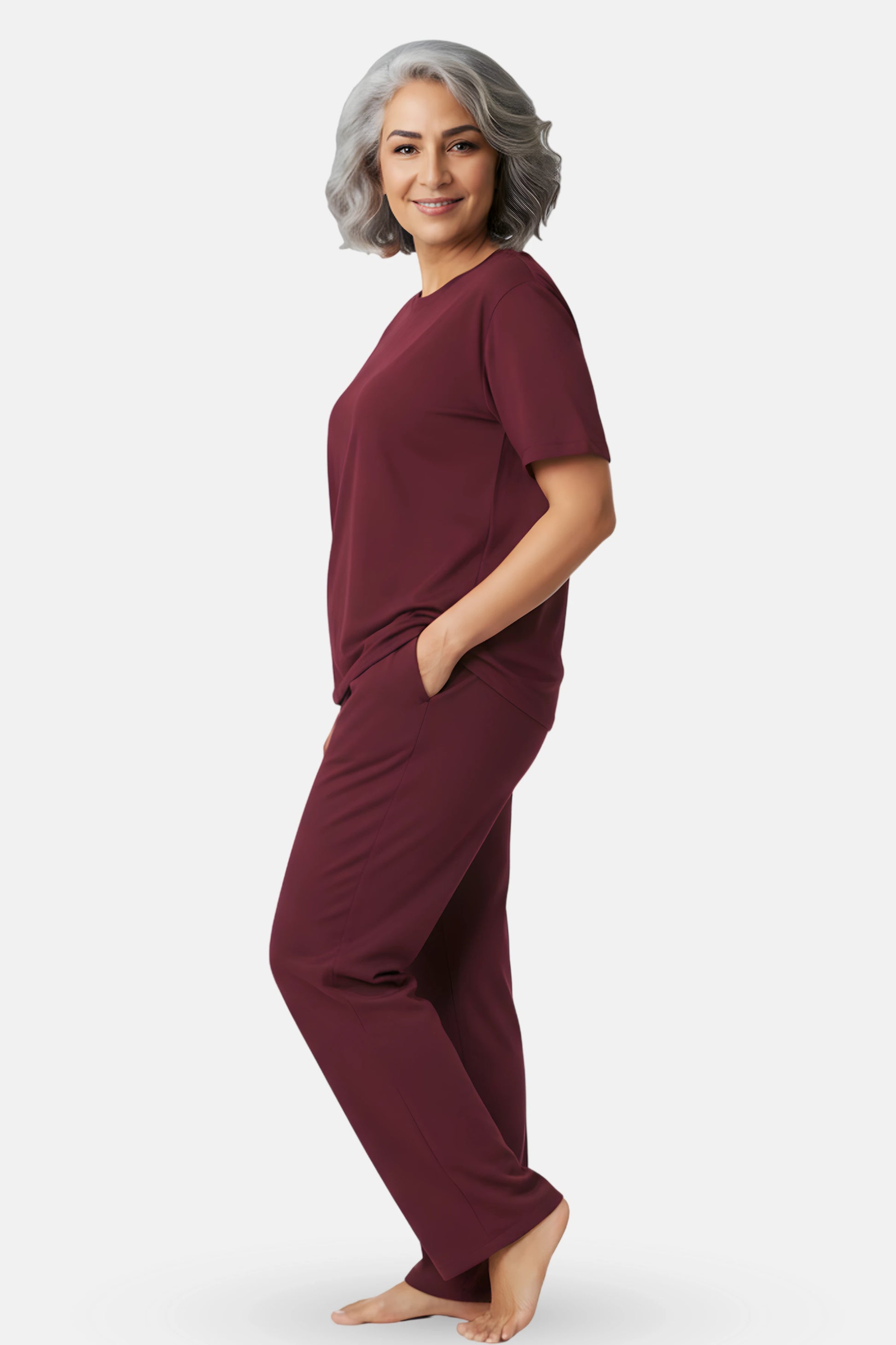 Woman wearing a wine pajama set