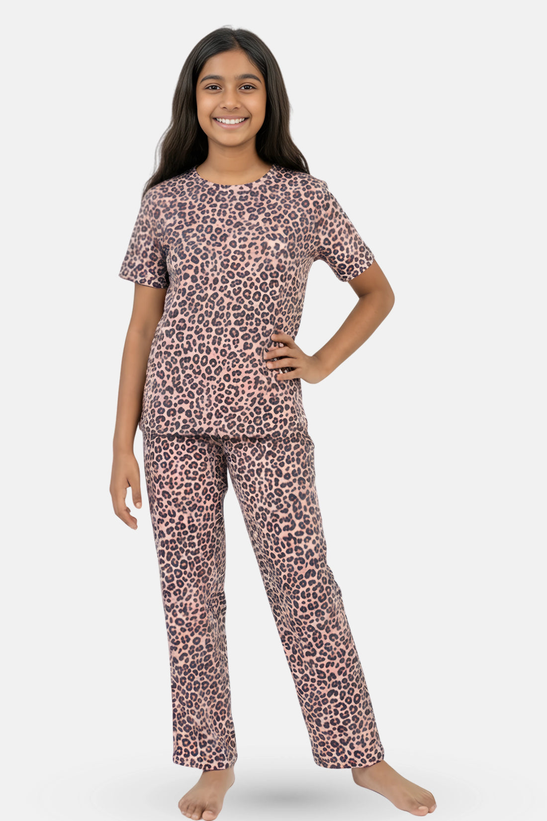 Teen wearing a brown leopard print pajama set
