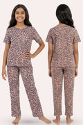 Teen wearing a leopard print pajama set