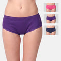 A model is wearing purple teen's boxer, with three smaller inset images on the right showing the same underwear in pink, purple, and navy.