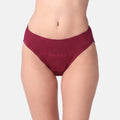 A close-up of a model's lower torso wearing a maroon color, set against a plain light gray background.