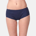 A model wearing navy blue boxer against a light gray background.