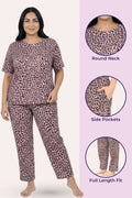 Woman wearing a brown leopard print pajama set with product details