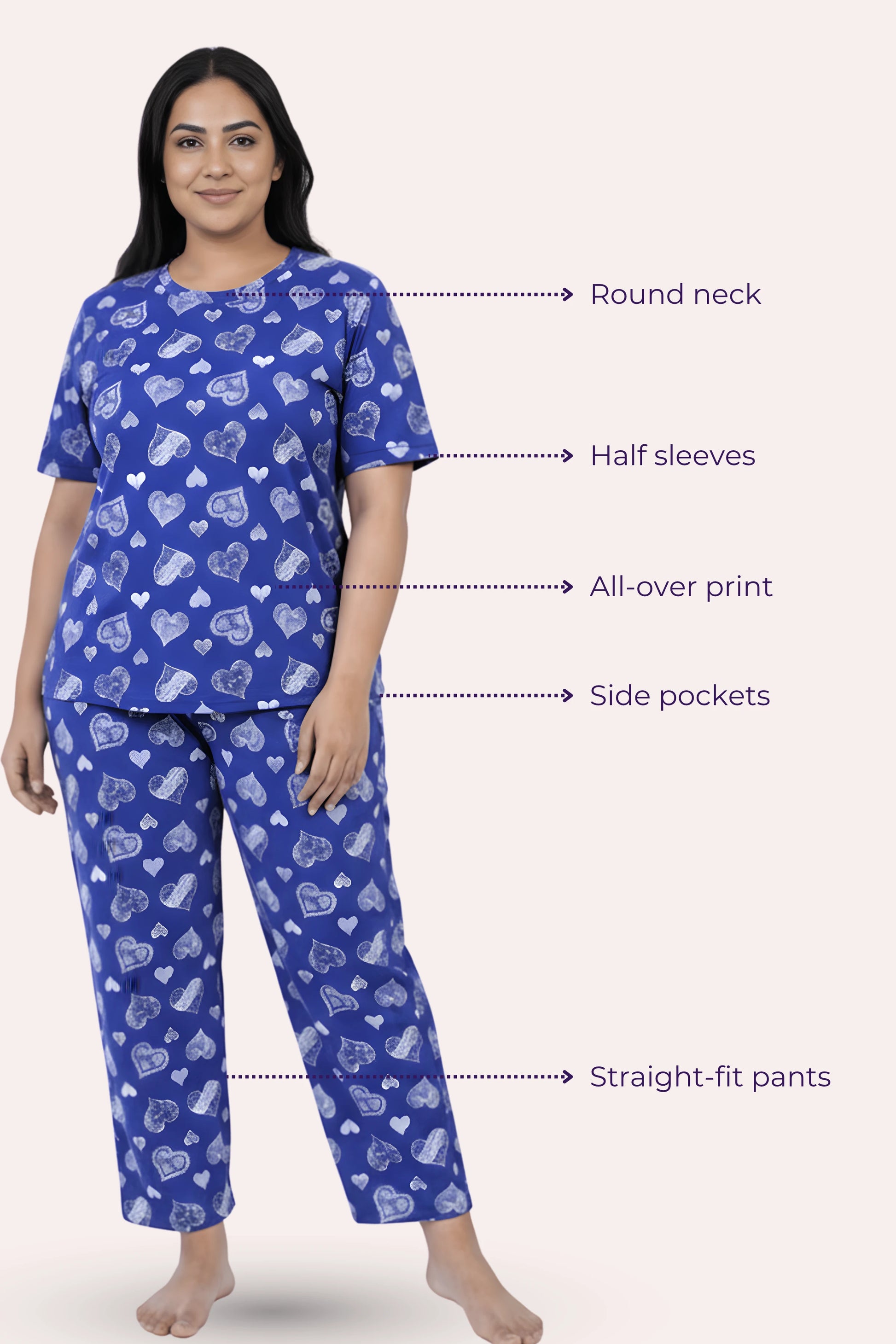 Woman wearing a navy hearts pajama set with labeled features