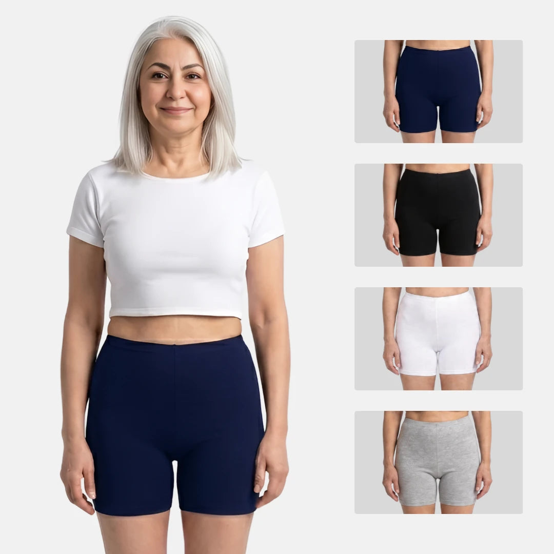 Woman wearing navy blue undershorts with inset images of the different colors same products