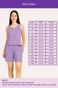Woman wearing a lavender outfit with a size chart on a purple background