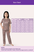 Size chart for girl pajamas with a model wearing the pajamas