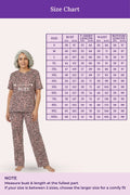 Woman wearing a pajama patterned outfit with a size chart