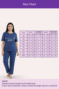 Woman wearing a airforce navy outfit with a size chart