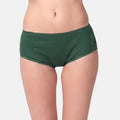 A model wearing dark green boxer-style underwear against a light gray background.