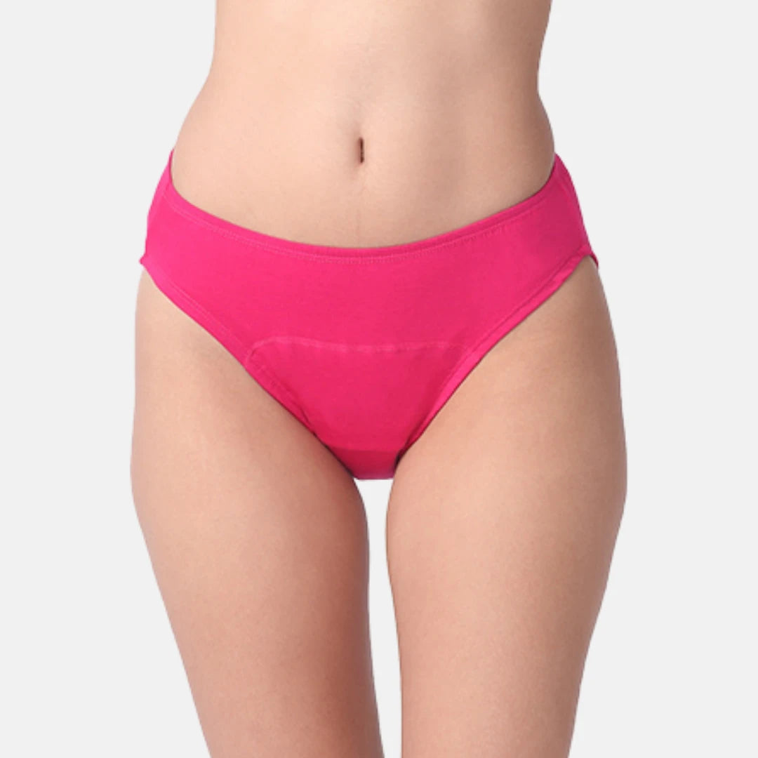 Dark pink hipster by a model, shown from the waist to upper thighs against a plain light gray studio background.