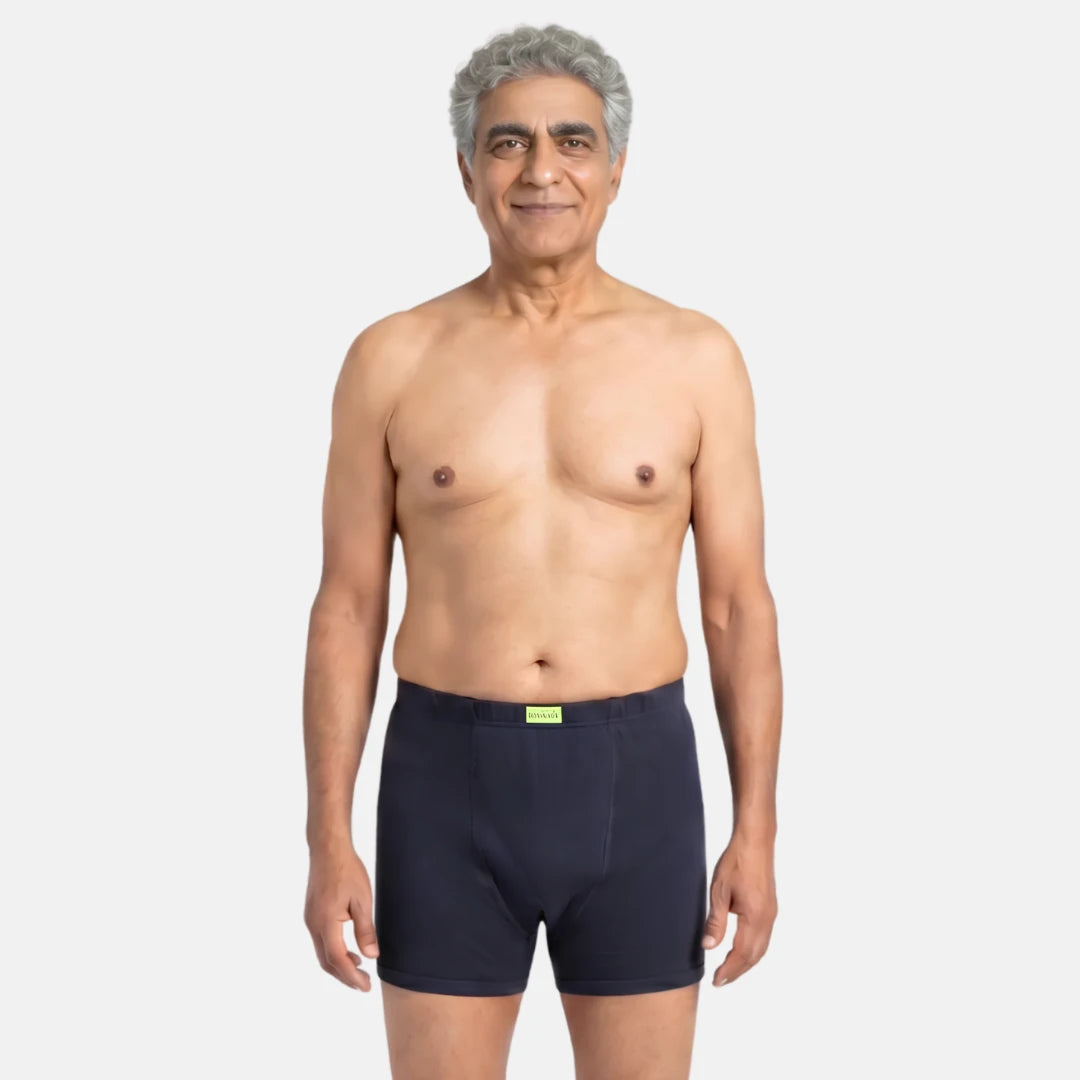Man wearing navy blue Incontinence trunk