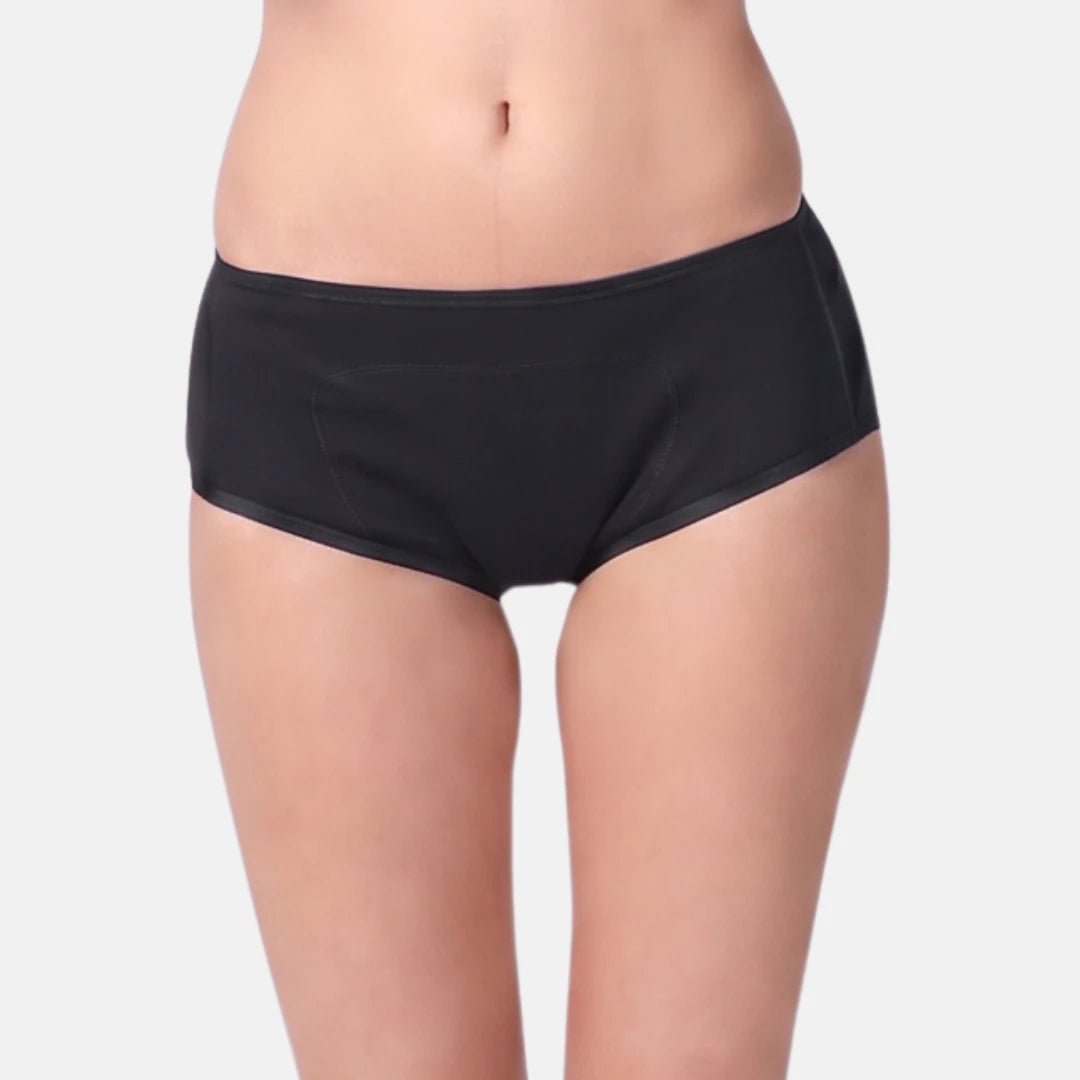 Black teen's boxer shown on a model from the waist to upper thighs against a light gray background.